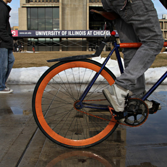 riding a bike by university Hall