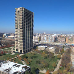 aerial view of the 300-feet-tall University Hall building
