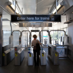 student entering the blue CTA train stop