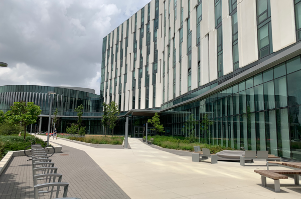 Bike racks and green infrastructure outline the landscaping design of teh Academic and Residential Complex from June 2020